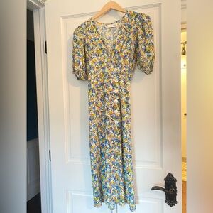 Faithful the Brand dress. Side buttons and wrap style dress.